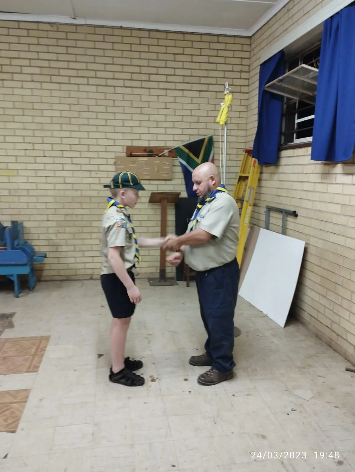 An artist badge and a new scout
